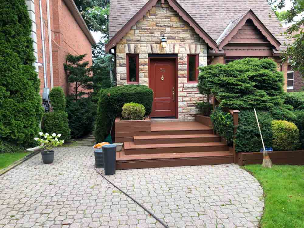 Composite front porch with wide stairs