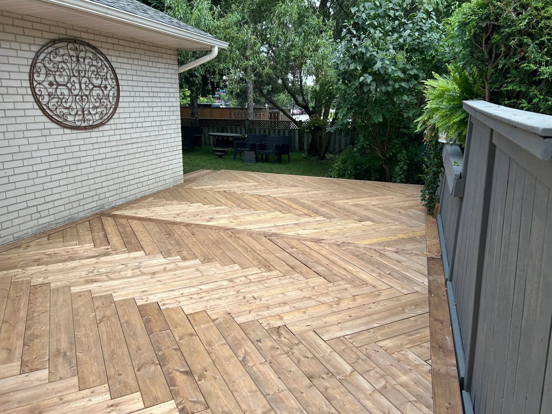 Herringbone pattern wood deck | East York